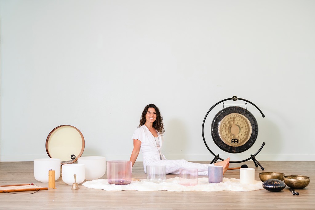 Zen Soul Balance practitioner sitting with sound bath instruments