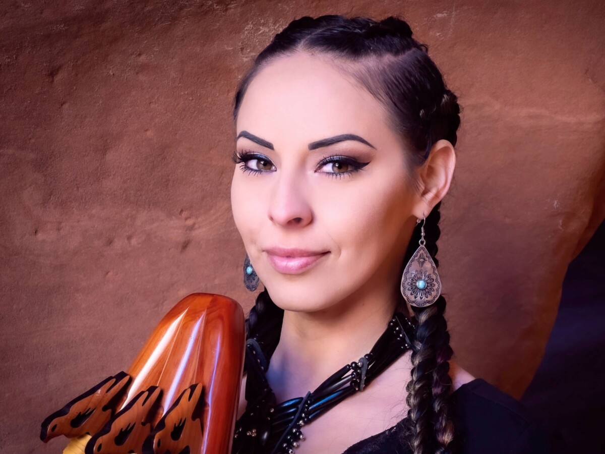 Portrait of woman with traditional musical instrument